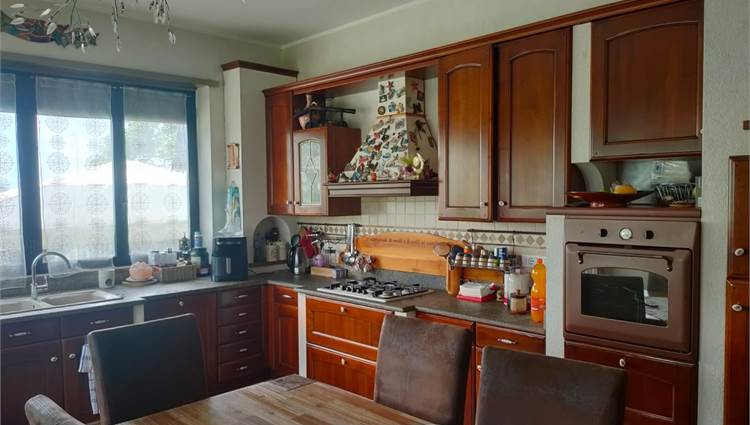 Soggiorno con cucina a vista