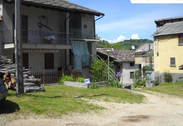 Porzione di bifamiliare con terreno
