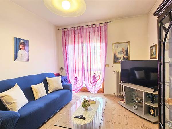 Appartametno con vista impagabile, giardino privato e posto auto condominiale 