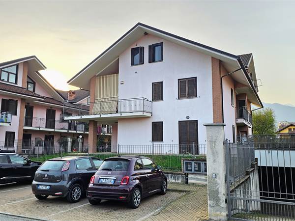 Appartamento con giardino privato e box auto